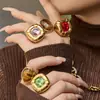 Anillo Misterioso de Acero Inoxidable Vidrio de Color Piedra Ojo de Tigre Color Oro 18K Conservación del Color Diseño de Nicho Lujo Ligero Anillo Retro
