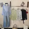 26 Camisa de Rayas Ligeramente Transparente de Moda Coreana de Alta Gama para Mujer