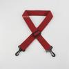 Mochila de nuevo estilo con color de acento, hebilla ajustable, nailon tejido, gancho giratorio de plástico de 38 mm, correa para el hombro, hebilla de plástico