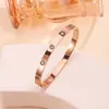 Pulseira de titânio e aço de alta qualidade com diamantes pulseira de aço inoxidável ouro 18k real galvanoplastia em forno pulseira feminina que abre