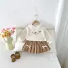 Conjunto de Dos Piezas Estilo Universitario para Niñas Primavera y Otoño 2026: Cuello Redondo, Lazo, Manga Larga, Elegante Falda Corta Plisada Conjunto para Bebé Niña