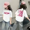 Nova Camiseta Estilosa de Manga Curta para Meninas Verão 2026, Blusa Fina da Moda para Crianças Maiores