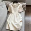 2026 Nuevo Vestido Casual de Lino con Perlas y Falda Elegante de Color Sólido Estilo Chanel de Longitud Media Venta al por Mayor H02Cq8778