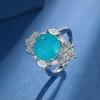 Aretes Imitación Paraíba para Mujer Europeos y Americanos Lujo Incrustados Diamante de Alto Carbono Collar Anillo Abierto Traje Tesoro de Color Mujer