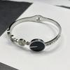 Pulsera europea y americana simple de acero de titanio chapado en oro de 18 quilates con micro incrustaciones de circón colorido de diamante completo, pulsera de moda ins para mujer en stock al por mayor