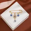 Broche de Borla Ojo del Diablo con Pedrería Creativa Europeo y Americano para Mujer, Pin de Estilo Vintage para Ceñir la Cintura de Suéter Ojo Azul de Alta Gama