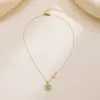 Colar de prata de lei 925 com moeda de cobre e jade Hetian feminino verão luxo leve nicho senso de design Pingente de fecho de segurança Lucky Brand corrente para clavícula