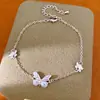 Pulsera de mariposa con incrustaciones de circonita y baño de oro real de 14k, brazalete de nicho de lujo ligero, joyería de moda dulce y elegante