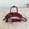 Bolsa de Bolinho Estilo Coreano Tendência Feminina 2026 Nova Leve Luxuosa Nicho Alta Costura Moda Versátil Ombro Transversal