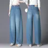 Jeans azules de guadaña hechos a medida para mujer, nuevo estilo otoño 2026, populares este año, pantalones de pierna ancha para petite
