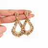 Brincos de Zircônia Vazados em Forma de Gota d'Água para Mulheres Estilo Novo Luxo Leve Sensação de Alto Padrão Design de Nicho Tarraxas Retrô Acessórios de Brincos Exagerados Personalizados