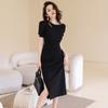 2026 Nuevo Estilo de Verano Moda Femenina Diseño Moderno Hueco Mangas Abullonadas Ajustado Negro Vestido de Longitud Media 30112