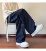 Primavera e Outono Novo Jeans Masculino Estilo Americano Moderno Bordado Simples Moda Jogger Fino High Street Versátil Calças Casuais Soltas