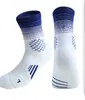 Calcetines prácticos de baloncesto de caña alta gruesos para hombre calcetines de media caña para correr medias bádminton calcetines deportivos de élite al por mayor