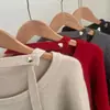 Ins diseño de nicho estilo coreano sexy cuello halter banda cuello redondo simple perezoso versátil suéter de punto de lana 26164