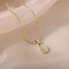 Colar Oval de Aço Titânio de Entrada Simples de Luxo Nicho Pingente Olho de Gato Corrente da Clavícula Design Elegante Joia de Alta Qualidade