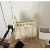 Bolso de cubo con cordón de cadena acolchado estilo Chanel transfronterizo para mujer, nuevo bolso pequeño de hombro y bandolera moderno y a la moda 2026