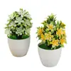 Planta artificial em vaso com flor de ameixeira de cinco folhas para decoração de mesa de jantar em ambientes internos. Ideal para decoração de interiores.