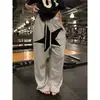 Pantalones casuales retro con parche de estrella americana para hombres y mujeres, nuevos pantalones largos holgados de pierna ancha, fluidos, adelgazantes, versátiles