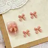 Mini accesorios para uñas de lazo al por mayor tamaño pequeño tridimensional combinan con todo lazo de cinta resina accesorios para uñas DIY