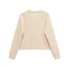 Venta al por mayor transfronteriza Verano 2025 Nuevo estilo europeo y americano para mujer Falda corta amarilla estilo Cardigan de punto de manga larga con cuello redondo