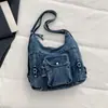 Bolsa de mezclilla casual de gran capacidad para mujer, nuevo modelo 2026, mochila para la ciudad, bolso de hombro y cruzado multiusos, moderno