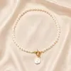 Collar de perlas elegante de moda europea y americana, collar con colgante de perlas redondas de verano para mujer, nueva cadena de clavícula que combina con todo.