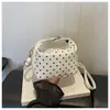 2026 bolsa de maquillaje de lunares coloridos de nicho versátil nueva de gran capacidad portátil para cosméticos y artículos de tocador para mujeres