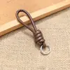 Bolsa de Corda de Couro PU Colorida Pingente Estilo Miu Simples Versátil Charme de Bolsa Chaveiro Acessório Lanyard de Celular Estilo Curto Novo