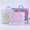 Ropa Infantil para Bebés Bolsa No Tejida Juego de Dos Piezas Textil para el Hogar Empaque de Cuatro Piezas Bolso de Mano Bolsa a Prueba de Polvo LOGOTIPO Imprimible