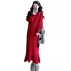 Ropa de maternidad otoño e invierno holgada de moda nuevo estilo purpurina fina engrosado temperamento adelgazante suéter de punto dulce de moda falda de cola de pez