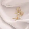 Broche de Espiga de Trigo Dorado Mate para Ramillete Traje Accesorios Versátiles de Alta Gama Pin Fijo Anti-Exposición Personalizados para Mujer