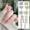 2025 Nuevos Accesorios para Uñas Ojo de Gato Flor Lazo Cadena de Perlas Colgante de Borla Zirconia Decoración de Uñas