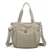 Bolso de Hombro Grande para Mujer Nuevo Tejido de Nailon Bolso de Mano Sencillo Ligero Bolso Tote para Viajes Transfronterizos de Mujer
