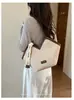 Bolso de hombro para mujer 2026 moderno casual tipo axila gran capacidad único nuevo diseño de nicho bolso tote con bloques de color para mujer