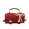 Bolsas Tendência deste Ano para Mulheres Primavera/Verão 2026 Nova Moda Versátil Bolsa Cilindro de Ombro Bolsa Transversal de Nicho para Mulheres