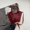 Bolso rojo para mujer 2026 nuevo bolso de otoño para bodas, bolso cubo de nicho de lujo ligero de alta gama para novia y dama de honor