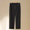 Calça mom versátil de cor sólida, nova calça de perna reta para mulheres de 50-60 anos, cintura elástica, calça feminina de meia-idade, calça longa de primavera e outono