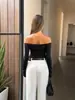 Ropa de mujer transfronteriza europea y americana, camiseta sencilla y versátil de corte ajustado, nuevo top de moda primavera-verano para el trabajo