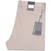 Serie Z Jie Jia Nuevos pantalones casuales de negocios para hombre finos de primavera y verano de Tencel y algodón de fibra larga elásticos lisos sin planchado antiarrugas