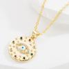 Nuevo collar colgante de ojo de diablo de estilo europeo y americano transfronterizo, chapado en oro de cobre con incrustaciones de diamantes, joyería creativa que combina con todo, de moda