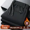 Pantalones casuales de otoño para hombre, originales del fabricante, elásticos, holgados, de pierna recta, forrados de polar, engrosados, cintura elástica, versión mejorada de pantalones largos