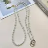 Elegante y estilosa cadena larga de perlas minimalista para teléfono, cadena cruzada para bolso de cámara, venta al por mayor para mujeres