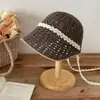 Nuevo Sombrero de Pescador con Cinta de Encaje Estilo Hada para Mujer 2026, Sombrero de Paja Tejido Hueco de Verano, Estilo Coreano, Sombrero de Cubo para Adelgazar la Cara