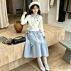 Traje de falda fresco y elegante, nuevo estilo coreano suave de primavera/otoño, camisa POLO con lazo dulce, conjunto de falda de dos piezas
