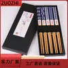 Novos na fábrica Estilo japonês Comércio exterior Impressos Pauzinhos de bambu Cinco azuis azul e branco Porcelana Pauzinhos de bambu para comércio exterior Venda por atacado
