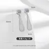 Pendientes largos de zircón vintage transfronterizos europeos y americanos, moda de lujo ligero, nicho, únicos, exagerados, pendientes de alta gama para mujer