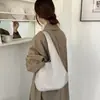 Bolso de mano de moda retro para mujer, estilo coreano, adecuado para el trabajo y los desplazamientos, bolso de axila, bolso de hombro de color liso de moda otoño 2026, venta al por mayor