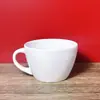 Taza de Cerámica con Asa de Color Sólido de Aspecto de Alta Gama para el Hogar Taza de Agua Popular con Estampado de Graffiti Taza de Leche Café
