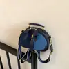 2026 Novo Modelo Bolsa Pequena Redonda Patchwork Bicolor Feminina, Bolsa de Ombro Único com Zíper, Bolsa Transversal Estruturada Fashionável para o Dia a Dia